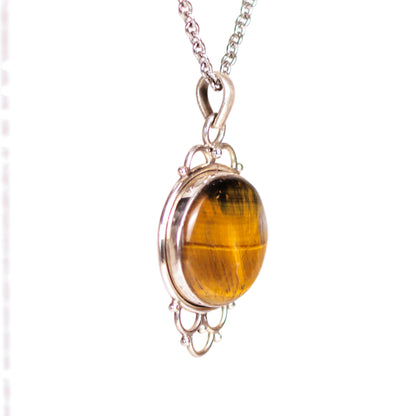 Vintage Looping Design Sterling Silver Framed Oval Shaped Tiger's Eye Pendant