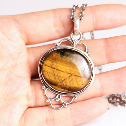 Vintage Looping Design Sterling Silver Framed Oval Shaped Tiger's Eye Pendant